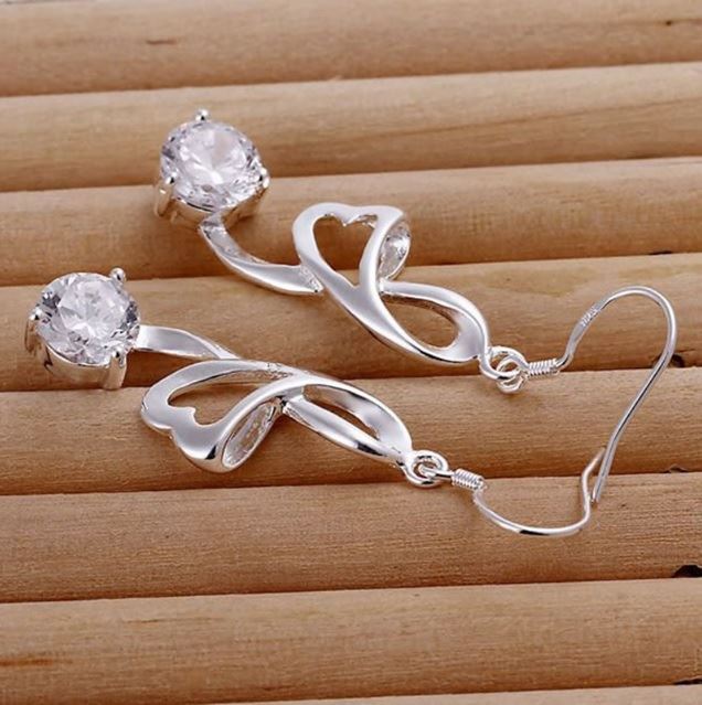 Women's Girls Stunning Silver Heart Ribbon Style Earrings With Sparkling Crystal Stone